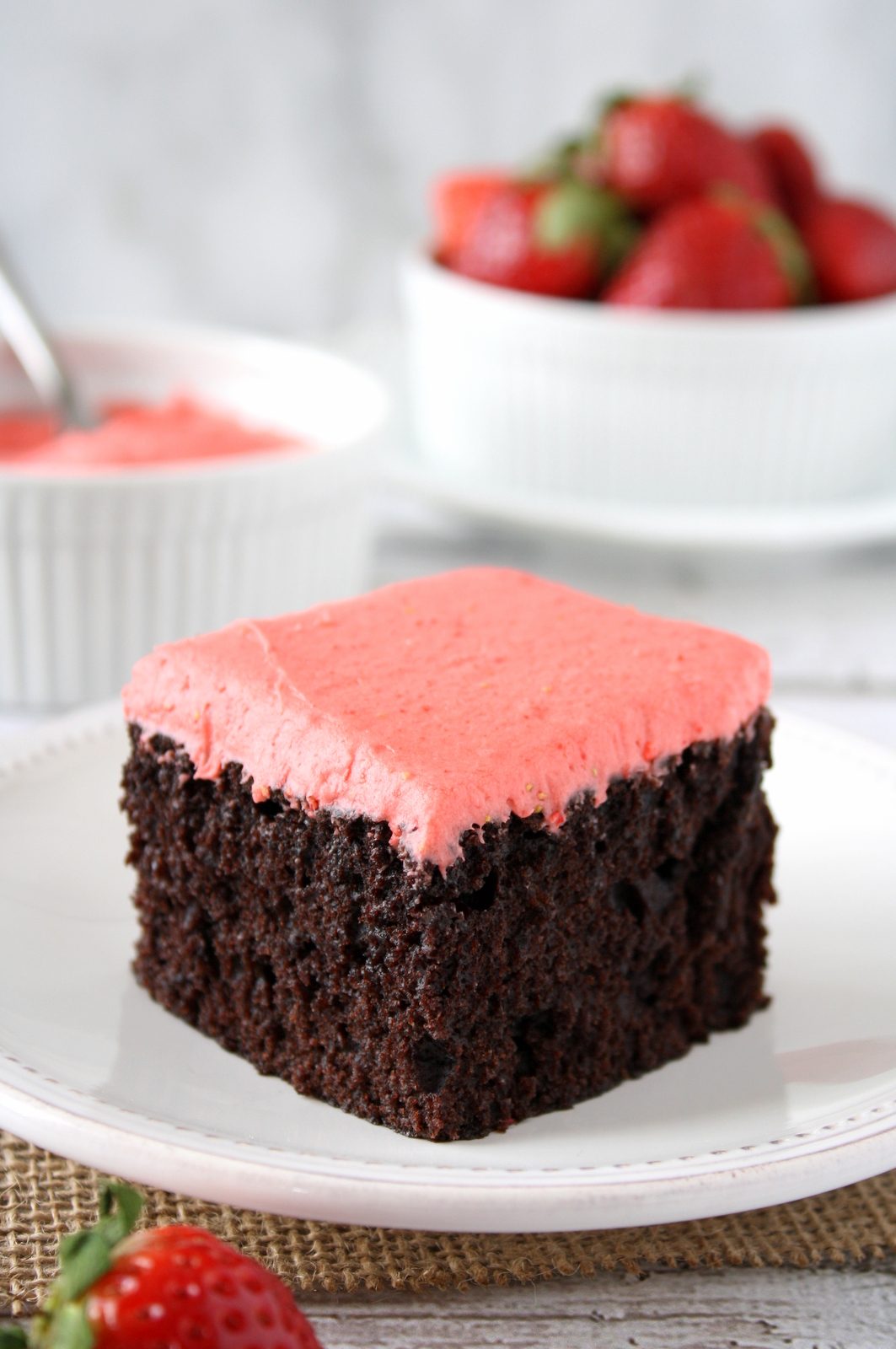 chocolate snack cake with strawberry frosting